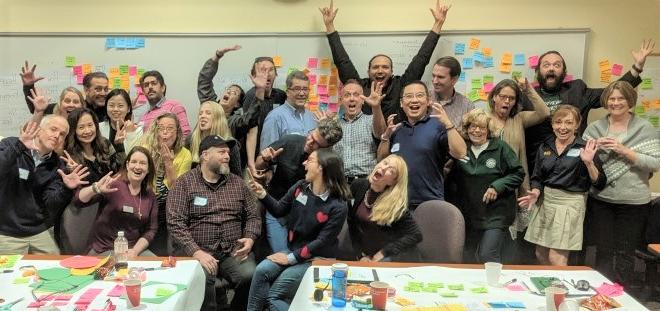 A group of happy students in a classroom. 