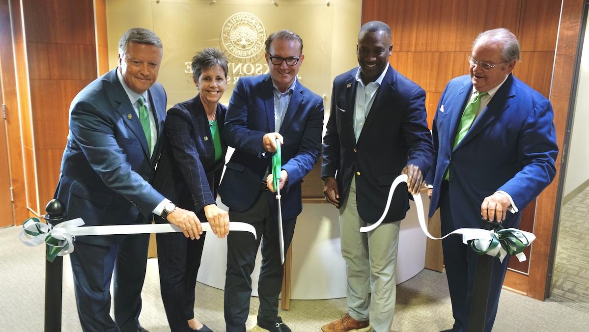 Group cuts the ribbon for the College of Law